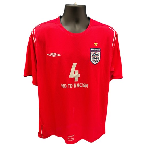59 - STEVEN GERRARD 2005 ENGLAND V HOLLAND MATCH ISSUED FOOTBALL SHIRT, SHORT SLEEVED RED AWAY SHIRT, NO ... 