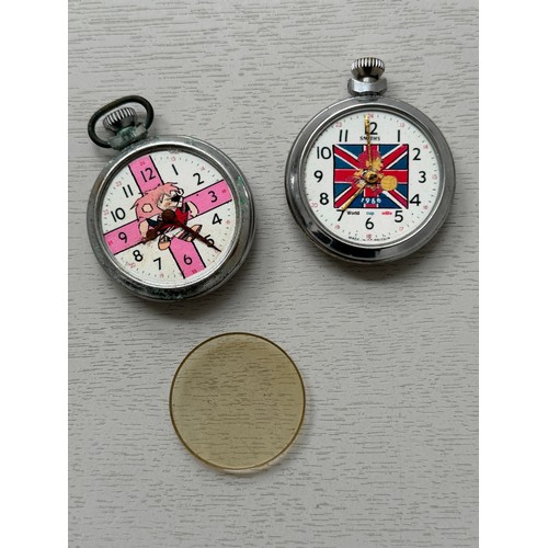 19 - 1966 WORLD CUP WILLIE ORIGINAL POCKET WATCHES, 2 EXAMPLES, UNTESTED, PINK/ WHITE EXAMPLE LACKS GLASS... 