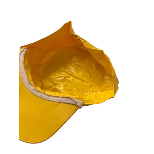 23 - 1966 WORLD CUP WILLIE ORIGINAL RAIN CAP, YELLOW WATERPROOF CAP, WITH WORLD CUP WILLIE TO FRONT.