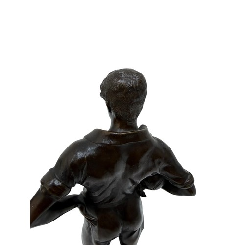 327 - A GERMAN BRONZE FIGURE OF A FOOTBALLER, CAST FROM A MODEL BY RUDOLF MARCUSE, THE FIGURE SHOWN STANDI... 