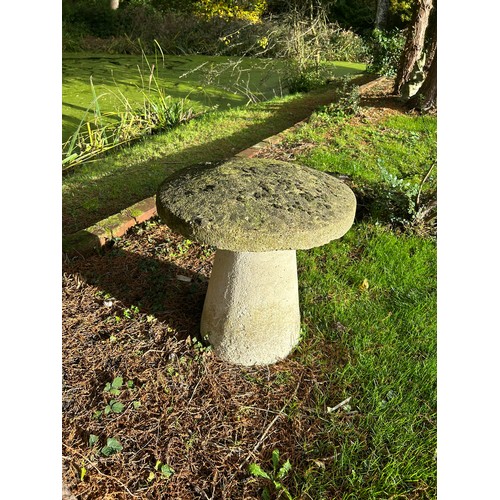 65 - A PAIR OF STADDLE STONES 
59cm x 57cm