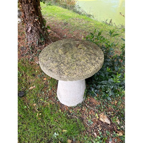 65 - A PAIR OF STADDLE STONES 
59cm x 57cm