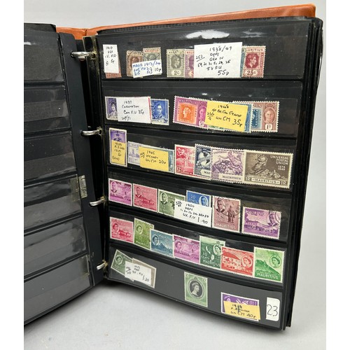 156 - A COLLECTION OF SIX WORLD STAMP ALBUMS, with material from The Seychelles, South Africa, New Zealand... 