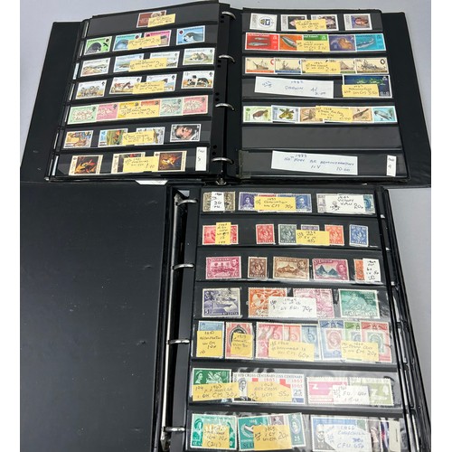 157 - A COLLECTION OF SIX WORLD STAMP ALBUMS, to include material from Aden, St Lucia, Papua New Guinea, A... 