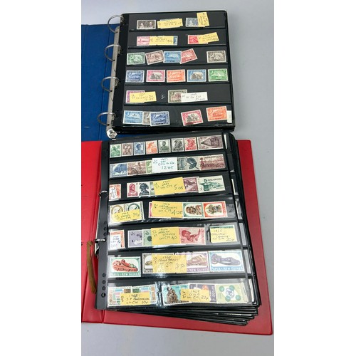 157 - A COLLECTION OF SIX WORLD STAMP ALBUMS, to include material from Aden, St Lucia, Papua New Guinea, A... 