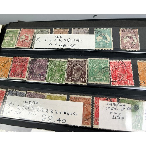 158 - A COLLECTION OF SIX ALBUMS OF WORLD STAMPS, to include Australian roo's, Barbados, Rhodes Island, Gh... 