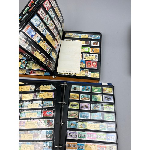 158 - A COLLECTION OF SIX ALBUMS OF WORLD STAMPS, to include Australian roo's, Barbados, Rhodes Island, Gh... 