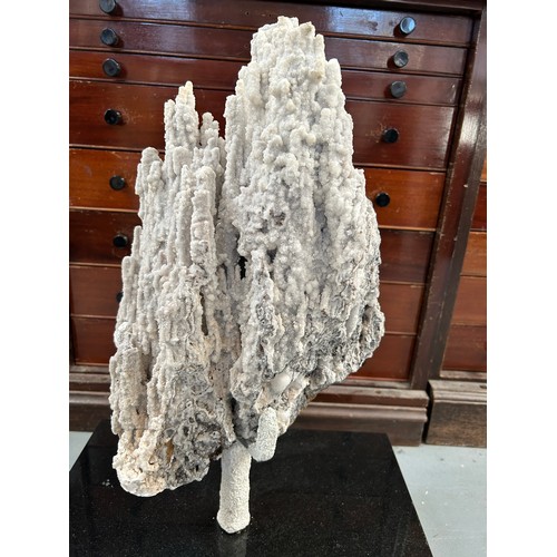 21 - A LARGE STALACTITIC QUARTZ MINERAL ON STAND,

65cm x 35cm including base