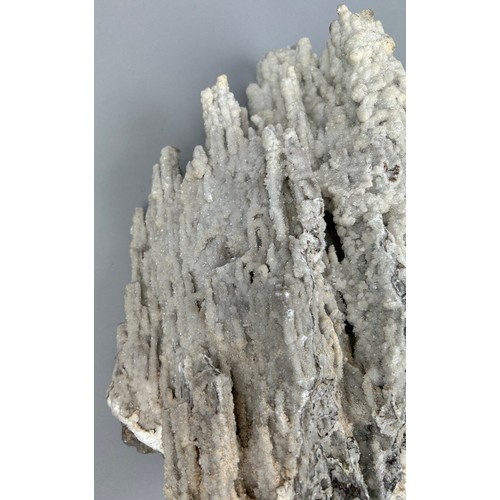 21 - A LARGE STALACTITIC QUARTZ MINERAL ON STAND,

65cm x 35cm including base