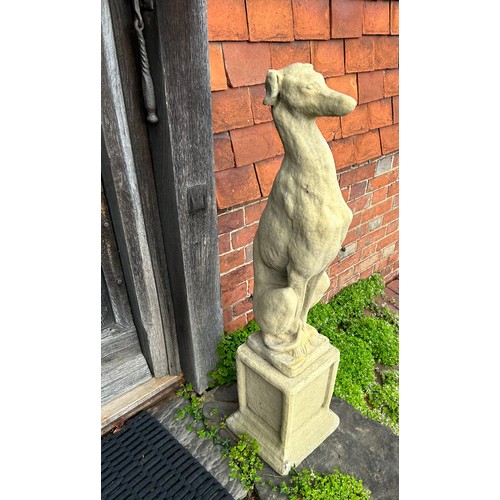 203 - A PAIR OF WHIPPET STATUES, reconstituted stone
111cm in height

Provenance: Derren Brown