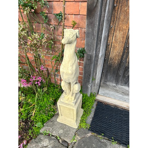 203 - A PAIR OF WHIPPET STATUES, reconstituted stone
111cm in height

Provenance: Derren Brown