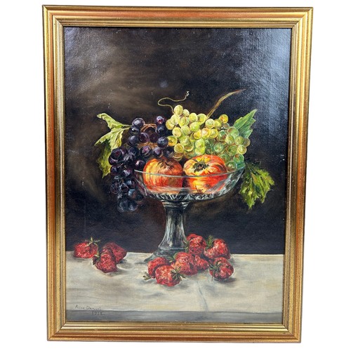 57 - AN EARLY 20TH CENTURY ENGLISH SCHOOL OIL ON CANVAS OF FRUITS, signed 'Alice Daniel 1912'

60cm x 44c... 