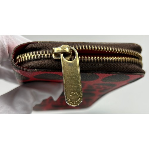 118 - A LOUIS VUITTON X YAYOI KUSAMA WALLET, red and brown monogram leather with zipped inner compartments... 