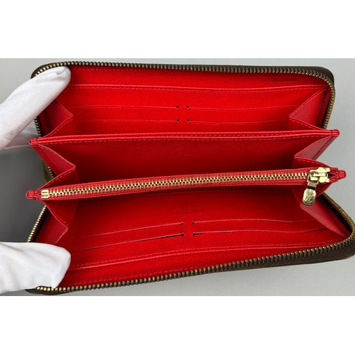 118 - A LOUIS VUITTON X YAYOI KUSAMA WALLET, red and brown monogram leather with zipped inner compartments... 