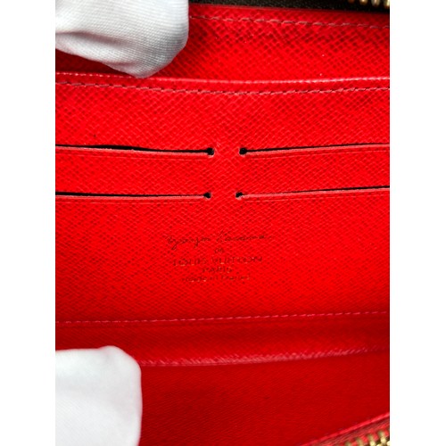 118 - A LOUIS VUITTON X YAYOI KUSAMA WALLET, red and brown monogram leather with zipped inner compartments... 