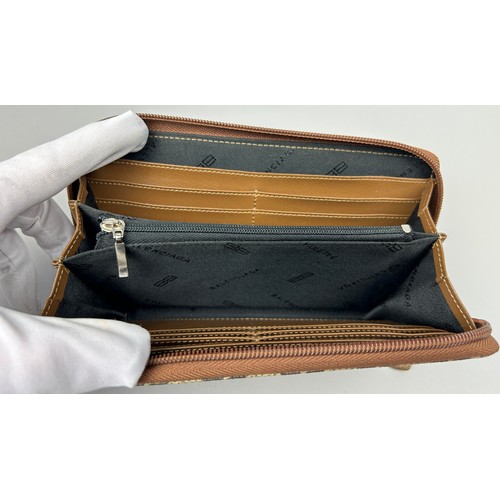 120 - A BALENCIAGA LADIES CLUTCH WALLET, with brown and beige interlocking monogram and inner zipped compa... 