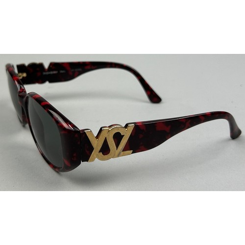 143 - A SET OF THREE DESIGNER SUNGLASSES, to include Yves Saint Laurent, Prada and Fendi (3)