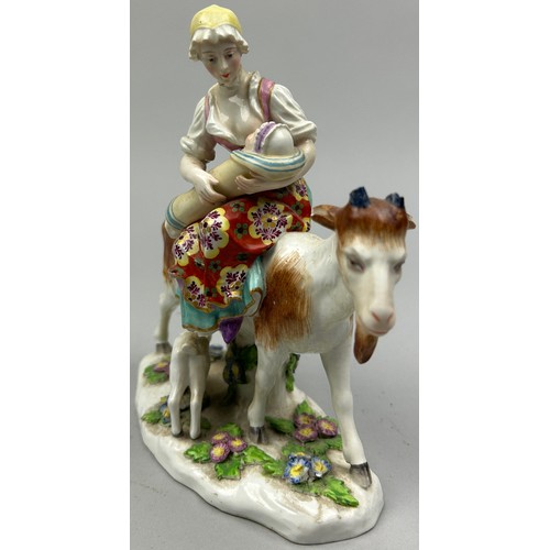 172 - A CHELSEA PORCELAIN CERAMIC GROUP OF A LADY WITH A GOAT, with gold anchor mark.