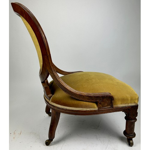 95 - ATTRIBUTED TO CHARLES BEVAN FOR GILLOWS NURSING CHAIR, upholstered in green velvet.

Stamped Gillows... 