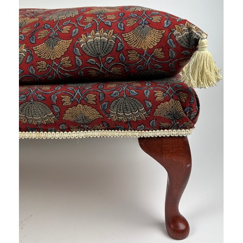 103 - A FOOTSTOOL UPHOLSTERED IN WILLIAM MORRIS STYLE FABRIC WITH FRINGE TASSLED CUSHION