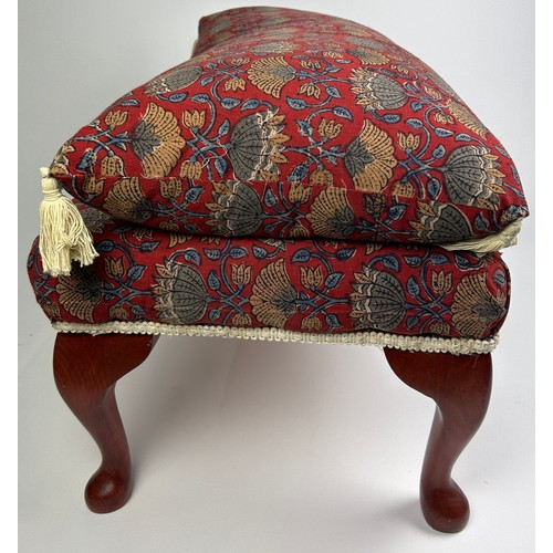 103 - A FOOTSTOOL UPHOLSTERED IN WILLIAM MORRIS STYLE FABRIC WITH FRINGE TASSLED CUSHION