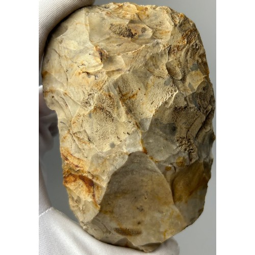 22 - A VERY LARGE PALAEOLITHIC FLINT HAND AXE, found in Suffolk, family collection.