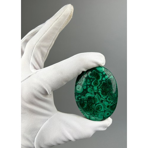 20 - A LARGE POLISHED MALACHITE STONE FROM THE CONGO