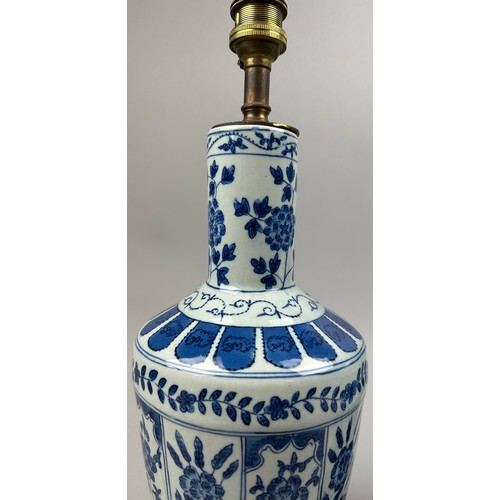 113 - A PAIR OF CHINESE BLUE AND WHITE VASES OF PAINTED FOLIATE DESIGN, adapted into lamps.