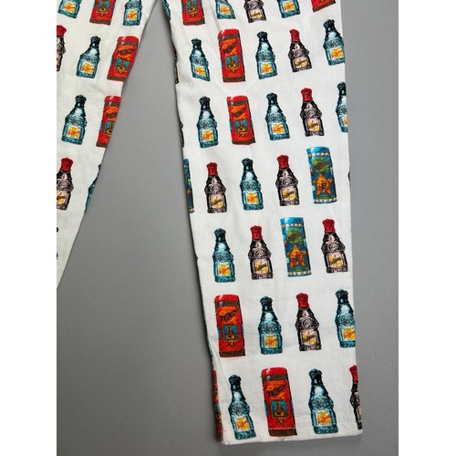 138 - A RARE PAIR OF 1980'S VERSACE POP ART ANDY WARHOL MANNER LADIES 'BOTTLE' TROUSERS


28' x 28'