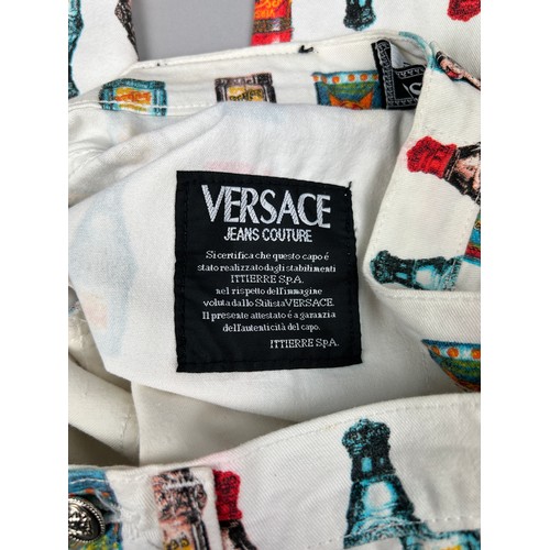 138 - A RARE PAIR OF 1980'S VERSACE POP ART ANDY WARHOL MANNER LADIES 'BOTTLE' TROUSERS


28' x 28'