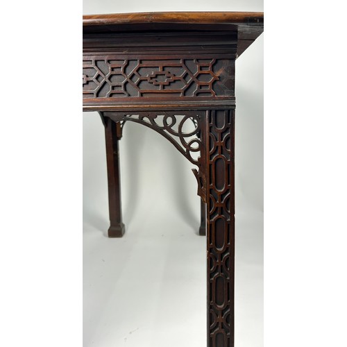 100 - A GEORGE III SERVING TABLE CIRCA 1780 IN MANNER OF THOMAS CHIPPENDALE, Chinese gothic design with la... 