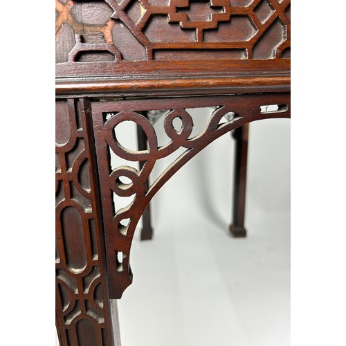 100 - A GEORGE III SERVING TABLE CIRCA 1780 IN MANNER OF THOMAS CHIPPENDALE, Chinese gothic design with la... 