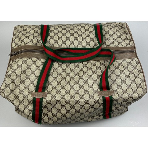 131 - A LARGE GUCCI HOLDALL BAG

45cm x 33cm x 23cm