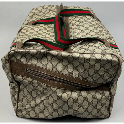 131 - A LARGE GUCCI HOLDALL BAG

45cm x 33cm x 23cm