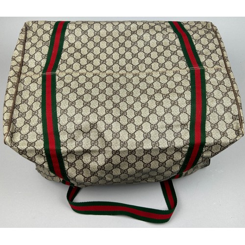 131 - A LARGE GUCCI HOLDALL BAG

45cm x 33cm x 23cm