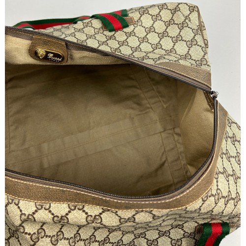 131 - A LARGE GUCCI HOLDALL BAG

45cm x 33cm x 23cm