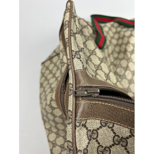 131 - A LARGE GUCCI HOLDALL BAG

45cm x 33cm x 23cm