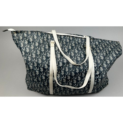 128 - A LARGE DIOR HOLDALL BAG WITH MONOGRAM DESIGN, 

55cm x 38cm x 15cm