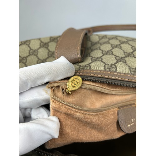 130 - A GUCCI MONOGRAM HOLDALL BAG

56cm x 28cm x 26cm