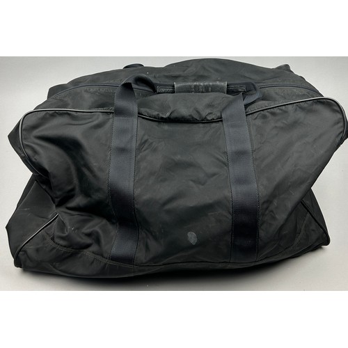 132 - A LARGE PRADA HOLDALL

78cm x 30cm x 36cm