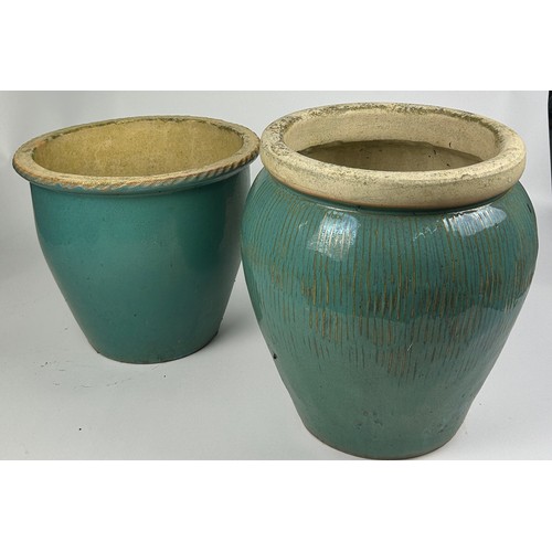 204 - TWO LARGE TURQUOISE GARDEN PLANTERS

Height: 40cm and 32cm