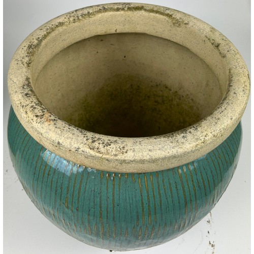 204 - TWO LARGE TURQUOISE GARDEN PLANTERS

Height: 40cm and 32cm