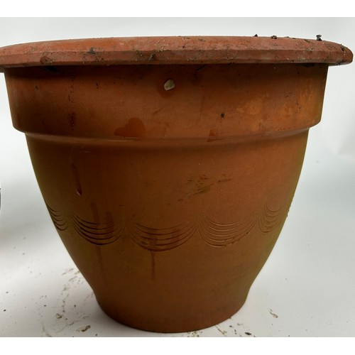 206 - THREE TERRACOTTA GARDEN PLANTERS