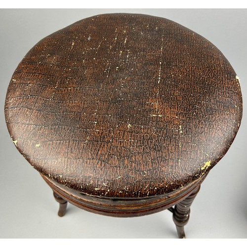 194 - AN EDWARDIAN ROTATING BROWN LEATHER PIANO STOOL ON TURNED LEGS AND STRETCHERS, along with a Victoria... 