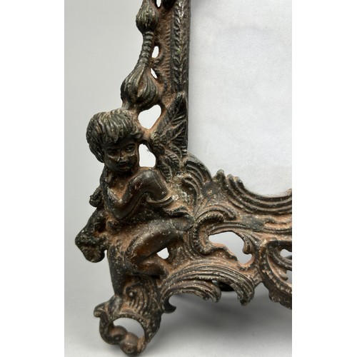 188 - A VICTORIAN ROCCOCO STYLE CAST COPPER PICTURE FRAME, with cherubs and a central figure