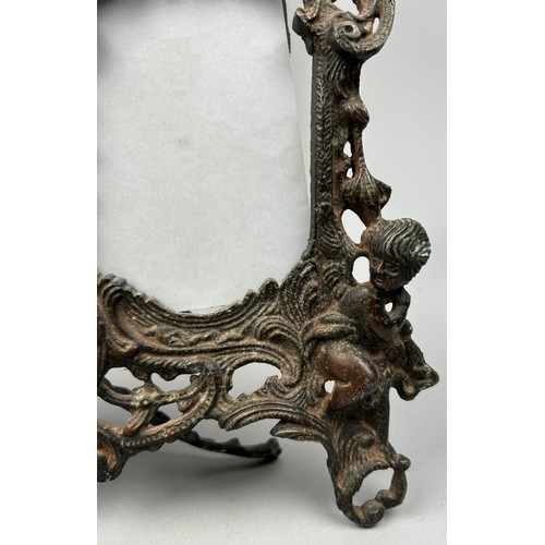 188 - A VICTORIAN ROCCOCO STYLE CAST COPPER PICTURE FRAME, with cherubs and a central figure