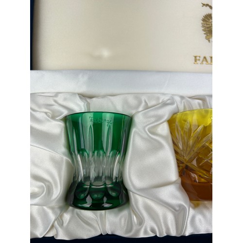 151 - A SET OF FOUR BOXED FABERGE SHOT GLASSES