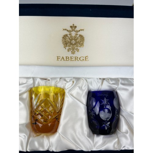 151 - A SET OF FOUR BOXED FABERGE SHOT GLASSES