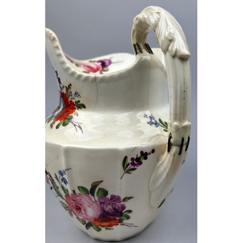 186 - A LARGE FLORAL CERAMIC JUG