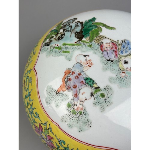 178 - A 20TH CENTURY YELLOW FAMILLE ROSE CHINESE PORCELAIN LIDDED BOWL WITH PAINTED IMAGERY OF CHILDREN PL... 